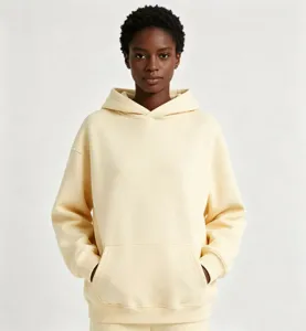 Sweat-shirt à capuche en molleton épais jaune beurre, coupe ample décontractée avec poche.
