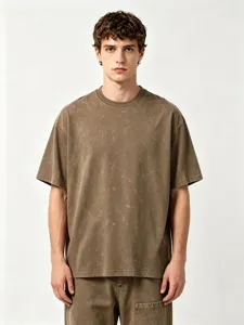 Detailed view of the vintage washed loose short sleeve t-shirt, comfortable drop shoulder design.