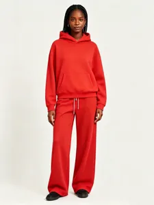 Detailed view of the red fleece hoodie and sweatpants set, cozy texture, casual design.