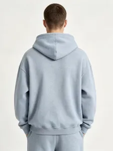 Heren lichtblauwe casual hoodie met capuchon achterkant, losse pasvorm herfst winter sweater.