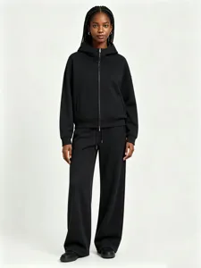 Black full-zip hoodie and wide-leg sweatpants set, comfortable casual daily wear.