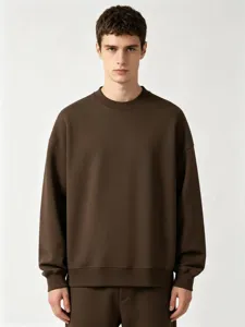 Solid dark brown crewneck sweatshirt detailed view, casual thick fabric mens apparel outfit.