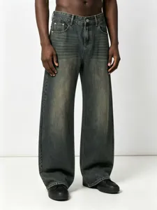 Detailed view of vintage washed wide-leg denim jeans, relaxed fit apparel with distressed finish.