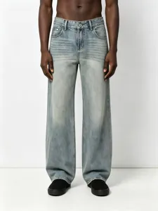 Detailed view of light blue washed vintage wide-leg denim jeans texture and relaxed fit style.