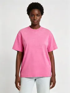 Oversized vintage washed pink t-shirt for women, casual short sleeve basic cotton top.