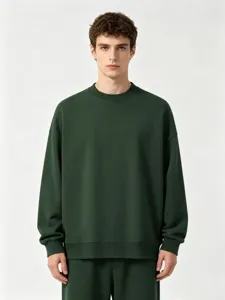 Dark green solid color crewneck sweatshirt fabric details, premium comfortable casual style.