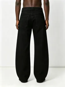 Detailed view of black loose fit straight leg denim pants, showing back pocket design and wide leg fit.