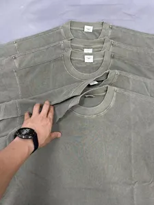 Detailed close-up showing the heavy salt-washed vintage t-shirt fabric texture and collar.