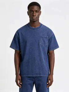 Detailed view of the dark blue washed denim short-sleeve t-shirt with a front chest pocket.