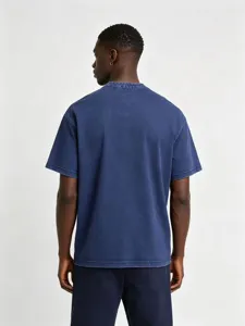 Back view detail of men's washed blue short sleeve cotton t-shirt casual wear top.