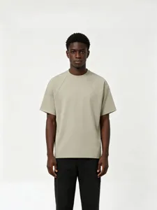 Men's casual short sleeve t-shirt with raglan panel design in solid sage green color.