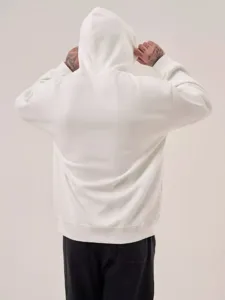 Solid color cotton fleece hooded sweatshirt for men and women, casual streetwear fashion style.
