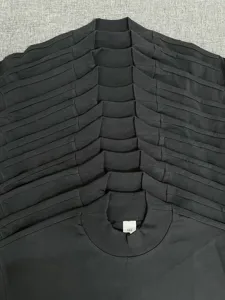 Heavyweight mock neck loose oversized short sleeve t-shirt detail view, black color.