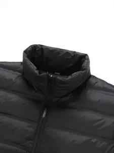 Black puffer jacket collar detail, stand up collar, warm winter apparel closeup view