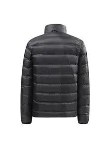 Back detail view of a black winter puffer down jacket, high collar warm outerwear for daily wear.