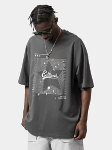 Detail shot of dark grey oversized streetwear t-shirt with graphic print and drop shoulders.
