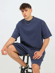 Detail view of the heavy washed navy blue short sleeve t-shirt and matching shorts outfit.