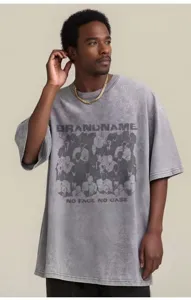 Grey washed oversized short sleeve t-shirt with graphic print and streetwear style details.