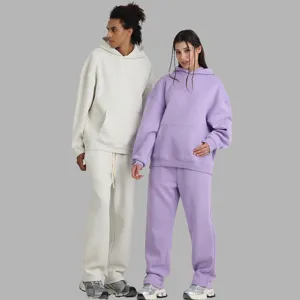 Heavyweight fleece hoodie and sweatpants set for men and women, cozy streetwear winter outfit.