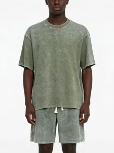 Detailed view of vintage washed green short sleeve t-shirt and matching shorts set.