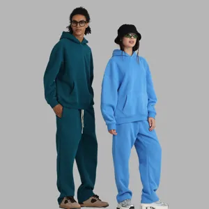 Casual fleece hoodie and sweatpants set detail showing soft thick fabric and relaxed fit.