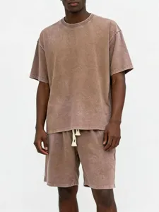 Men washed vintage short sleeve t-shirt and shorts set casual streetwear summer outfit.