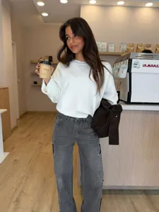 Women casual loose straight denim jeans with stylish star stitching details, detailed view.