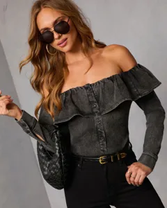 Vintage slim-fit off-shoulder denim top with elegant ruffles and front button details.