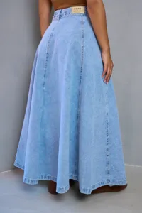 High-waisted light blue denim maxi skirt detailed view showing stitching and waistband brand patch.