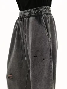 Men's autumn distressed cotton loopback sweatpants, loose straight-leg casual joggers detail view.