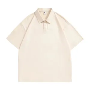 Close-up detail of the classic lapel and button placket on this solid color beige polo shirt.