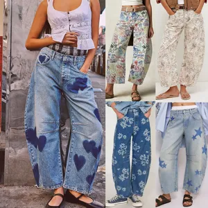 Women spring casual loose mid waist straight denim jeans with cute printed patch designs.