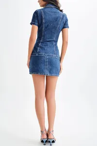 Back view detail shot of women denim short sleeve top and high waist mini skirt set