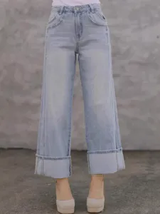 Women's casual loose mid-rise straight leg washed denim jeans with stylish cuffed hems.