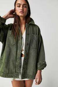Olive green denim shacket for women with front button closure and dual chest utility pockets.