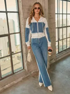Detailed view of the stylish patchwork denim two-piece set featuring trendy studded accents.