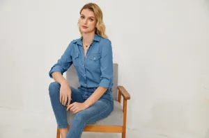 Women's long sleeve denim shirt with lapel and button closure. Casual style for daily wear.