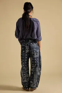 Women casual loose mid-rise wide-leg denim trousers detailed view featuring paisley pattern design.