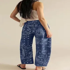 Women casual loose mid-rise straight leg denim jeans featuring a stylish blue paisley print.
