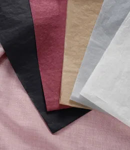 Detailed close-up view of multi-color tissue floral wrapping paper in various shades.
