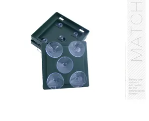Close-up detail shot of the green plastic floral foam base with heavy-duty clear suction cups.