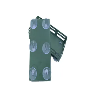 Green plastic floral mud suction cup holder with strong suction cups for wedding car decor.