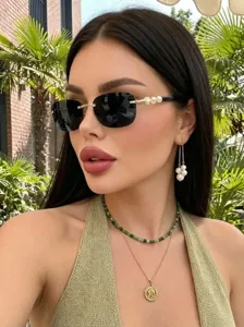 Damen rahmenlose Sonnenbrille mit Perlenbügeln und elegantem Modedesign für den Sonnenschutz.
