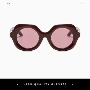 Chic oversized retro round sunglasses for women, featuring bold frames and pink lenses.