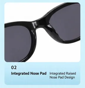 Closeup detail of retro black sunglasses featuring an integrated raised nose bridge for comfort.