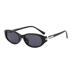 Retro black oval sunglasses for women, trendy narrow frame vintage sun protection eyewear.