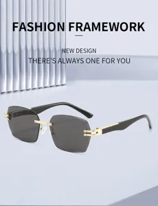 Modische Damen und Herren Sonnenbrille mit rahmenlosem Design, grauen Gläsern und Goldakzenten.