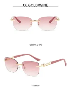 Bügellose Damen-Sonnenbrille mit Farbverlauf, eleganten Perlenbügeln und modischem Metallgestell.