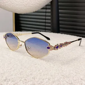 Luxury multi-sided metal sunglasses with gradient lenses and jeweled temples for women.