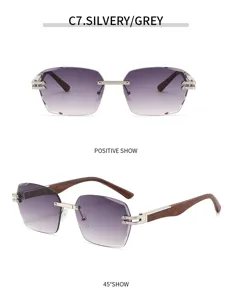 Blickdichte rahmenlose Sonnenbrille mit quadratischen Gläsern und edlen Holz-Bügeln im Detail.